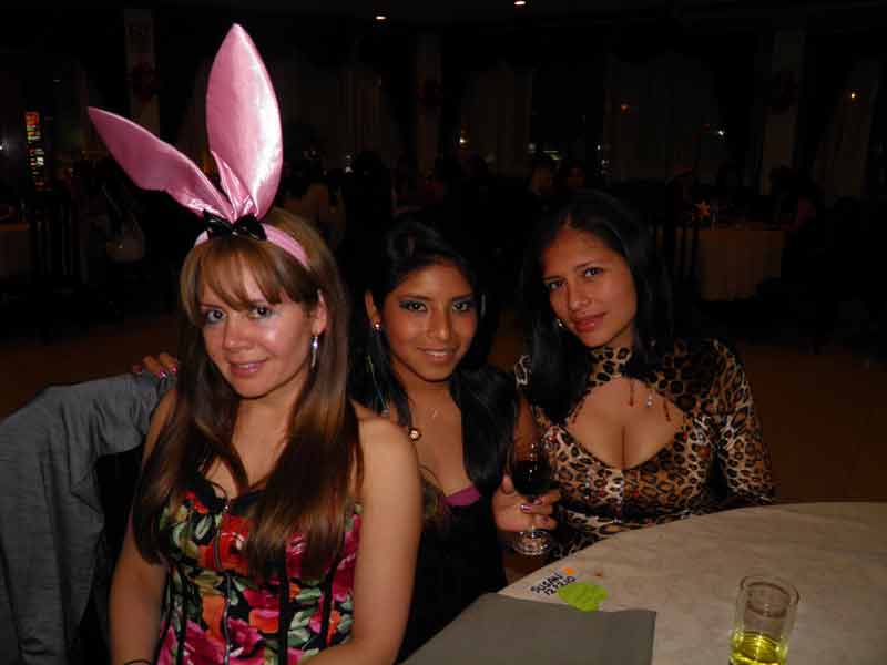 Young Mexican ladies pose for a picture